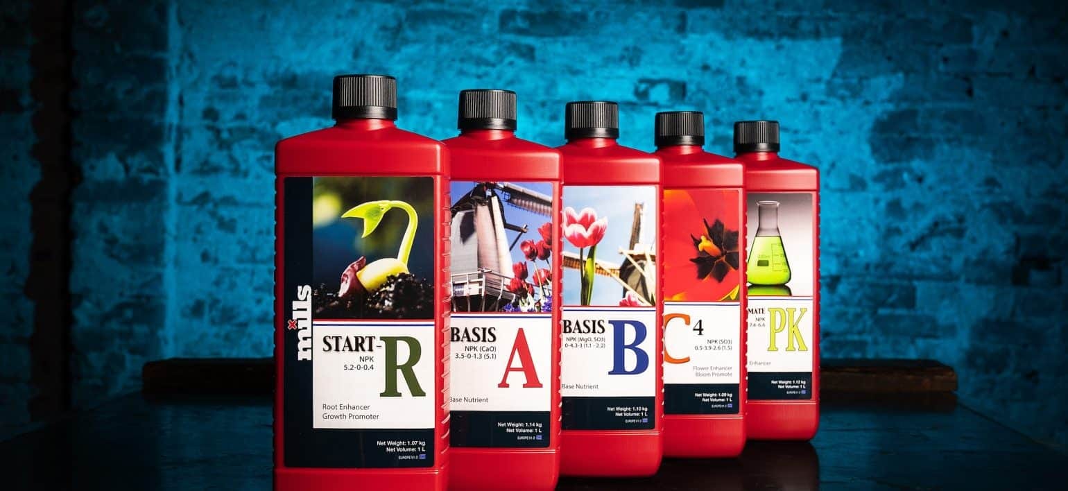 Mills Start-R, Basis A, Basis B, C4 and Ultimate PK booster bottles in a row